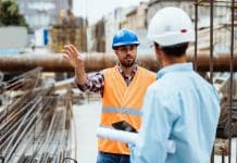 Building smarter, not slower: Why digital procurement is a necessity Contractor or engineer on the construction site, wearing PPE, representing digital procurement