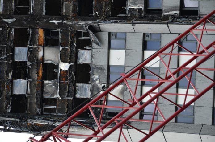 Grenfell Tower fire, North Kensington, London Grenfell Tower, residential tower block, North Kensington, London, England, severe fire, June 2017, representing mandatory competence for builders