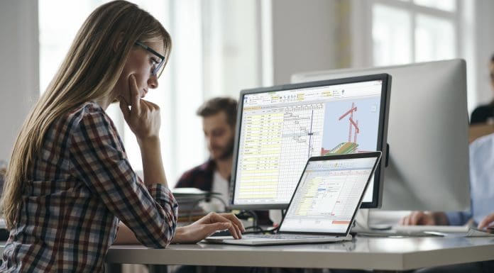 Young colleagues working in the office, representing model-based planning