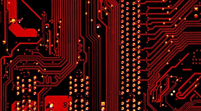 overview of a circuit in red light, representing responsible use of AI