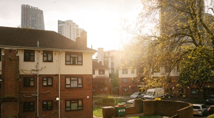 An apartment building area in London at sunset, representing UK council climate action