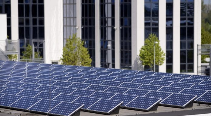 Public solar panels, like those pictured, have reduced the output of emissions in Devon's buildings and social housing