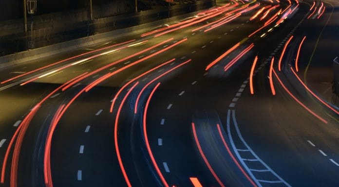 A highway at night , long exposure, representing infrastructure delivery