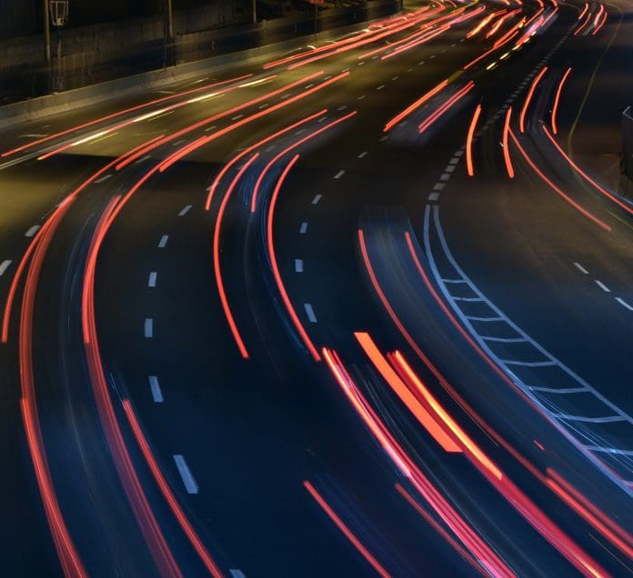 Turning up the dial on infrastructure delivery A highway at night , long exposure, representing infrastructure delivery