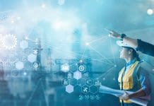 Construction industry outlook 2026: The trends shaping how contractors build, budget and deliver Male and female industrial engineers using tablet computer and blueprints checking and analysis data of power plant station project on network background, representing Construction industry outlook 2026