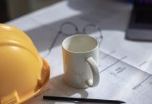 Planning Inspectorate workers to take industrial action over pay Architectural and Engineering Office Desk Background, Featuring Construction Project Ideas and Drawing Equipment.