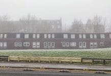 Planning bodies urge councils to factor climate change in planning traditional sand stone buildings and roads of glasgow during heavy fog wheather in Scotland England