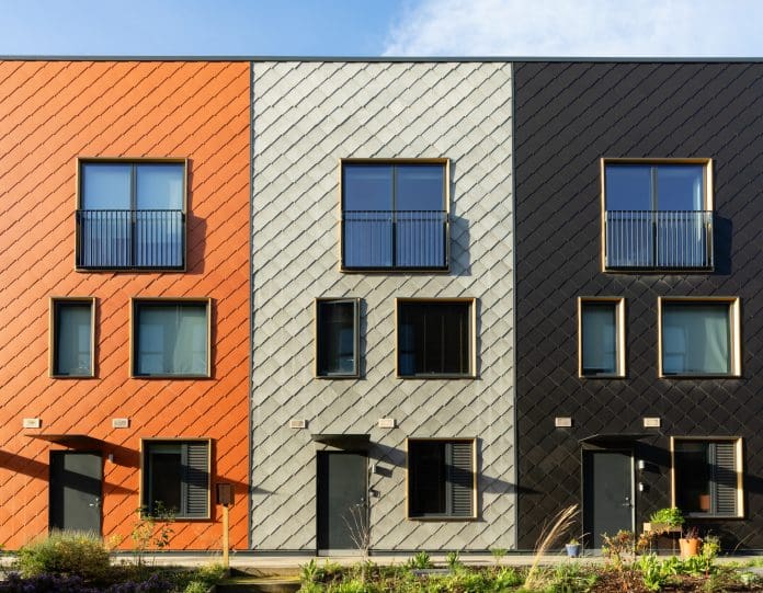 Expanding workforce and using MMC are vital for UK to meet 1.5 million housing target, says Actis Modern eco housing by the River Aire in Leeds. This row of townhouses has been built using more sustainable resources and designed to use less energy than most houses, representing meeting housing targets