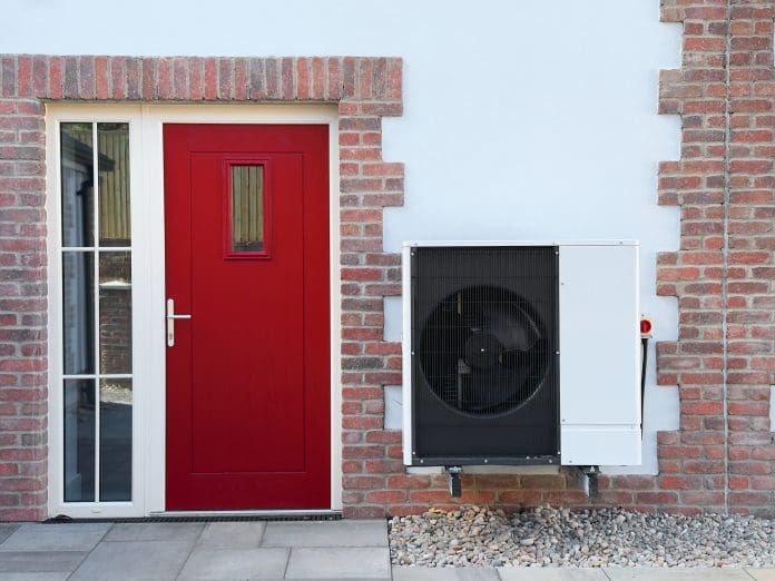 Heat pump condenser units for heating and cooling modern house UK