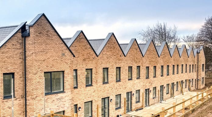 Bridgend, Wales, UK - 14 December 2025: New houses in a social housing development as part of the construction of a Wellbeing Village near Bridgend town centre, repreenting quality new homes