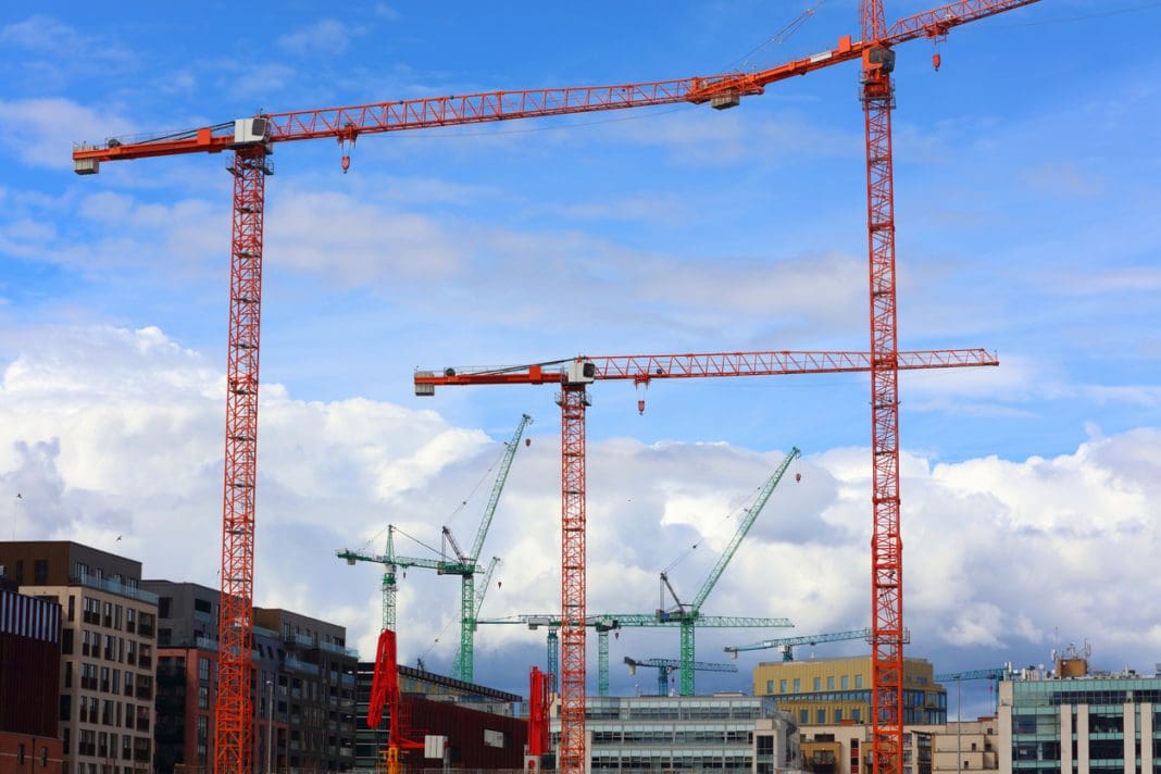 Construction site in North Wall in Dublin, Ireland. Construction cranes, representing MMC Ireland National Conference