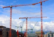 Ireland’s premier MMC & industrialised construction event returns Construction site in North Wall in Dublin, Ireland. Construction cranes, representing MMC Ireland National Conference