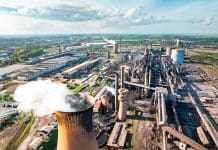 UK investor ‘very interested’ in takeover of British Steel Drone capturing a steel mill emitting smoke and steam during a vibrant sunset in Scunthorpe, uk