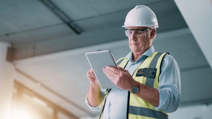 Building, tablet and engineering man inspection check of construction site, property development or design quality assurance. Architecture industry, contractor and technology for renovation progress ECITB launches digital learning system inspired by video games