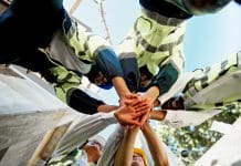 Equality, diversity and inclusion is the solution to the construction skills gap Construction, teamwork and hands together on site for support with building inspection and compliance success. Below, worker stack and people with celebration for project management and cooperation