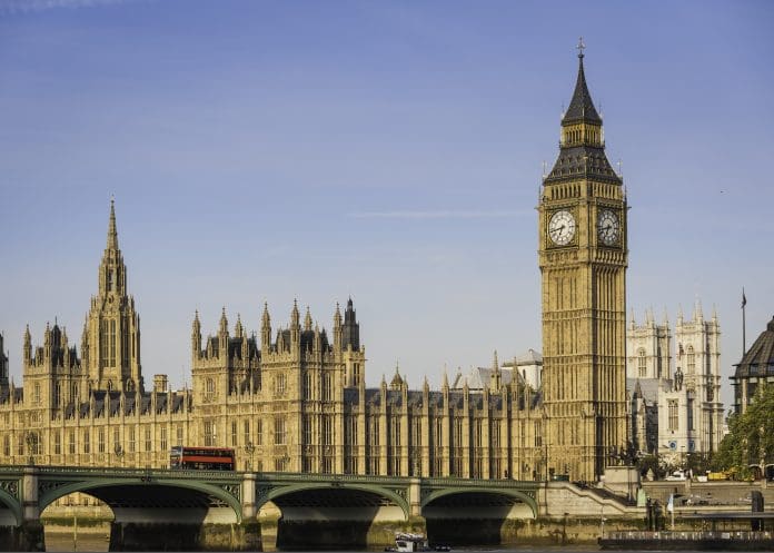 London Big Ben Westminster Bridge Parliament red bus Thames UK The King's Speech 2026 was accepted mildly by the construction industry