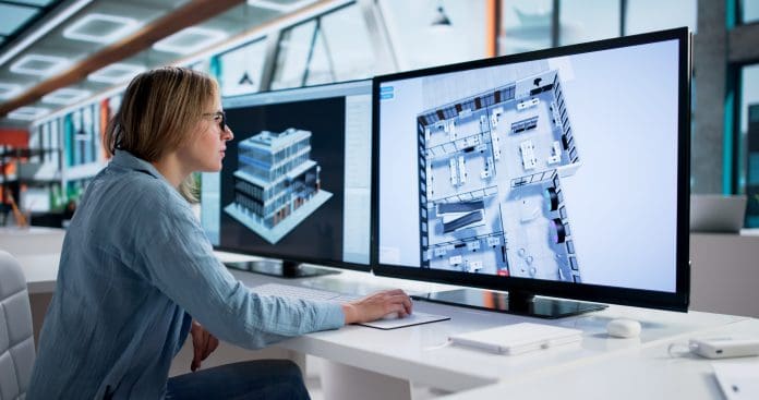 Female Architect Developing 3D Design Concept Professionals must upskill and adapt to lead the next decade of BIM in construction