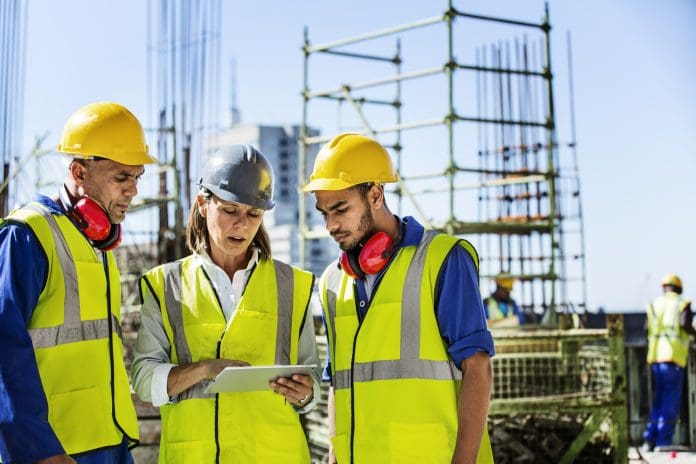 Architects using digital tablet at site Jacqui Smith, minister of state for skills, discusses the CITB and ECITB merger and its potential to bring construction skills reform