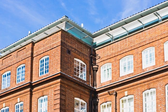 Red brick building futureproofing public sector procurement will be key to securing the built environment