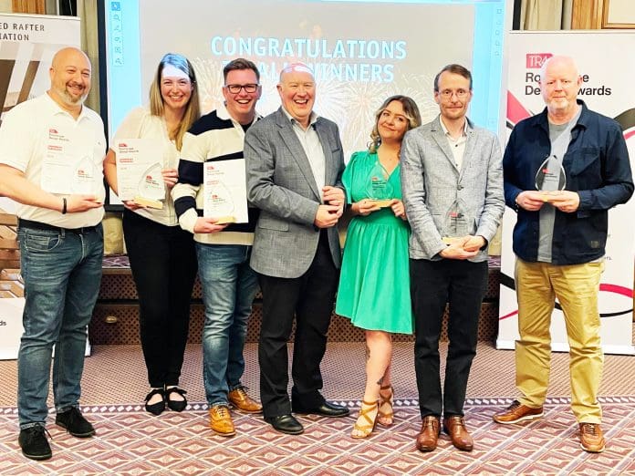Roofscape 2026 winners at award ceremony holding awards Winners of the Roofscape Design Awards 2026 announced