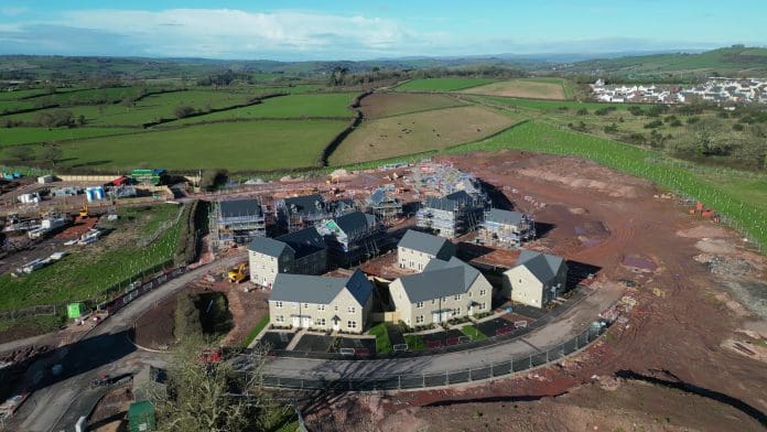 Paignton, Torbay, South Devon, England: DRONE VIEWS: A new build housing construction site on green belt land on the outskirts of Paignton (PHOTO 8) AHCI discusses the importance of structural warranty protection for developments