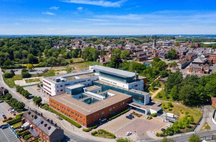 Aerial photo of the Pontefract Hospital located in the village of Pontefract in Wakefield in the UK on a sunny summers day showing the Hospital and grounds with a blue sky and white clouds in the sky Aerial photo of the Pontefract Hospital located in the village of Pontefract in Wakefield in the UK on a sunny summers day showing the Hospital and grounds with a blue sky and white clouds in the sky