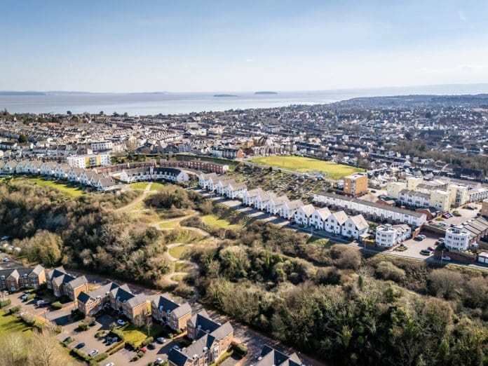 Houses on a steep hill in Penarth in Cardiff Wales extends three housing schemes, including Help to Buy