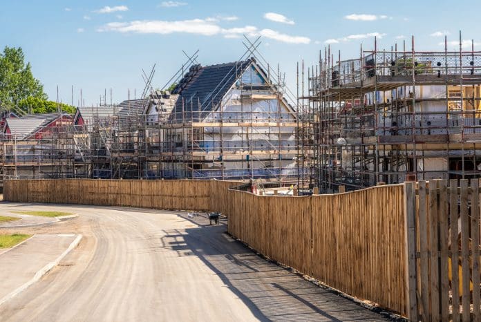Housebuilding progress on new estate Build warranty discusses structural warranty in UK housing