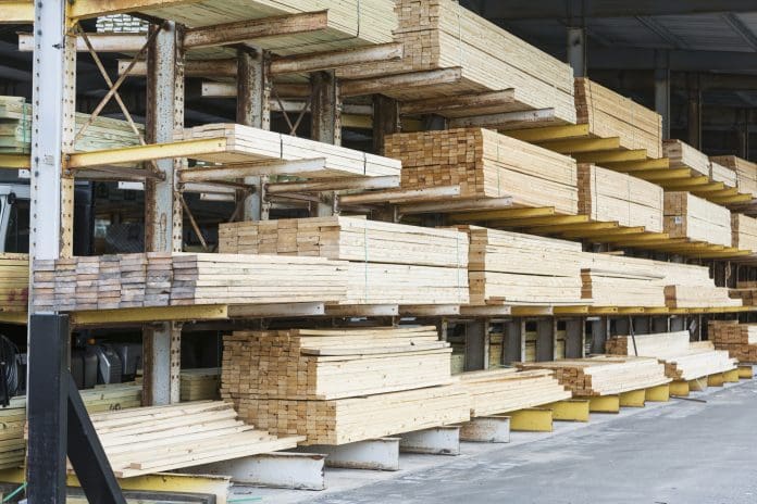Storage shelves in lumberyard Housing is dragging down the construction supply chain, according to the CLC
