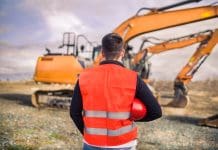 Equipment sales remain resilient in a changing market Construction,Worker,Or,Engineer,Wearing,Reflective,Vest,And,Holding,Safety