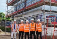 Timber frame assembly begins at affordable housing development in Rugby Timber frame assembly begins at affordable housing development in Rugby