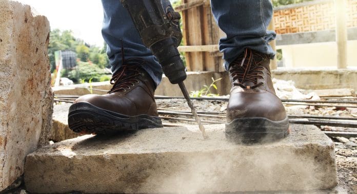 A worker was drilling rocks Government measures to clamp down on cowboy builders