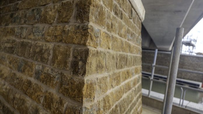 Close-up view of the ironstone caldding on one of the piers supporting the Oxford Canal viaduct Sept 2026 Closeup of the ironstone cladding on the HS2 Oxford Canal viaduct