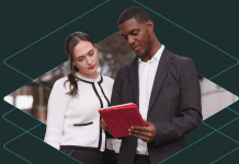 Building a workforce for the next era of construction A woman and man looking at a tablet