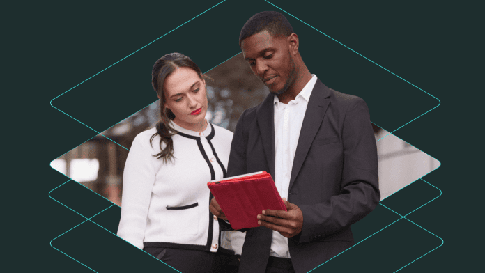 Revizto skills image 1 A woman and man looking at a tablet