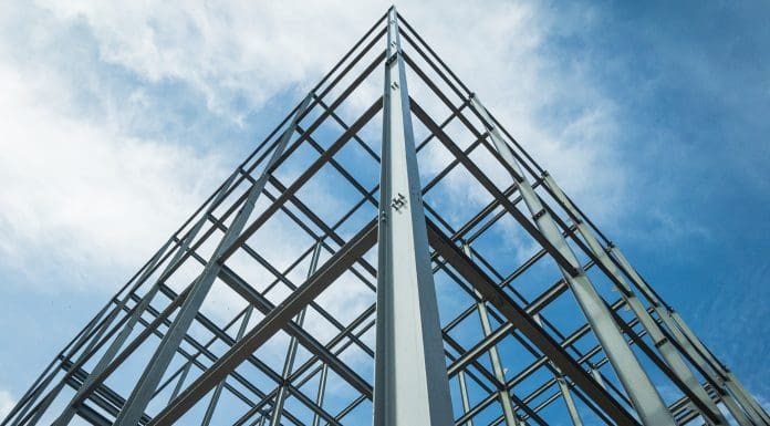 Structure of steel for building construction on sky background.