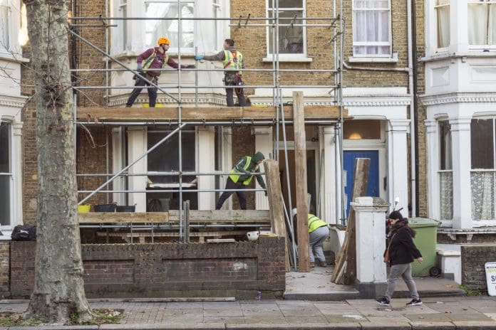 Workers on a scaffold Capacity to Build will support council housebuilding