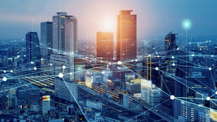 Smart city and communication network concept. 5G. IoT (Internet of Things). Telecommunication. Unlocking the potential of data in construction: Building a common approach