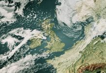Climate adaptation starts at home. We need to build capability from the ground up 3D Render of a Topographic Map of the United Kingdom with the clouds from August 23, 2024.