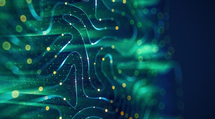 Abstract digital background featuring flowing blue and green lines with glowing yellow particles, evoking a sense of data flow or neural networks.