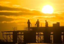 The heat is on: What this summer’s weather taught UK project teams silhouette of construction worker