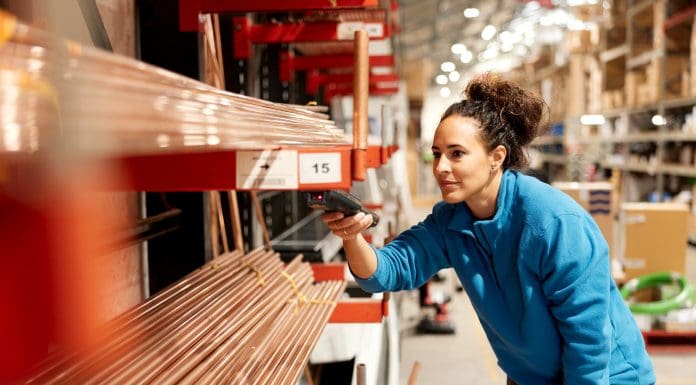 A worker uses a barcode reader.