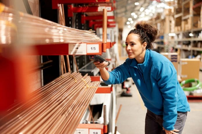 A worker uses a barcode reader.