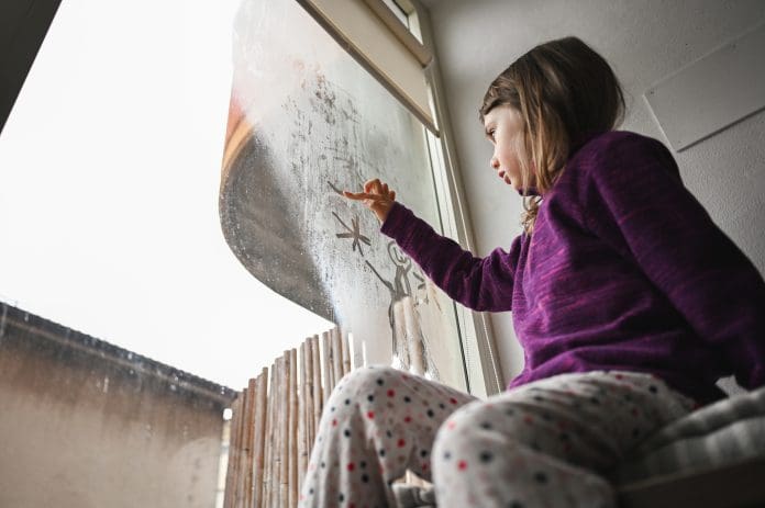 drawing on condensed window at home. Cornerstone is supporting healthy buildings