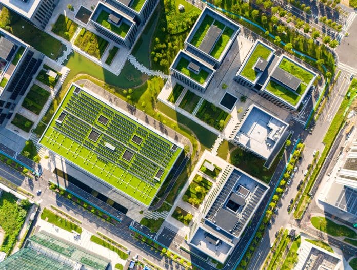 Solar panels on the roof of an urban eco-office building Are we really designing homes for the future? Rethinking how homes perform in a changing climate