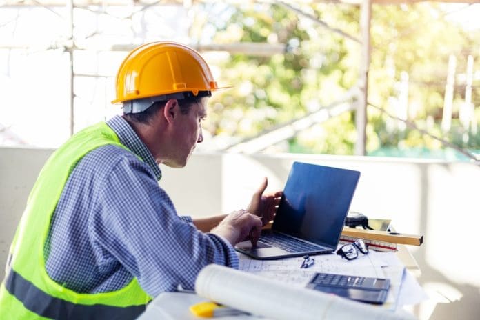 Caucasian,Male,Architect,Engineer,Construction,Worker,Using,Computer,Laptop,Working